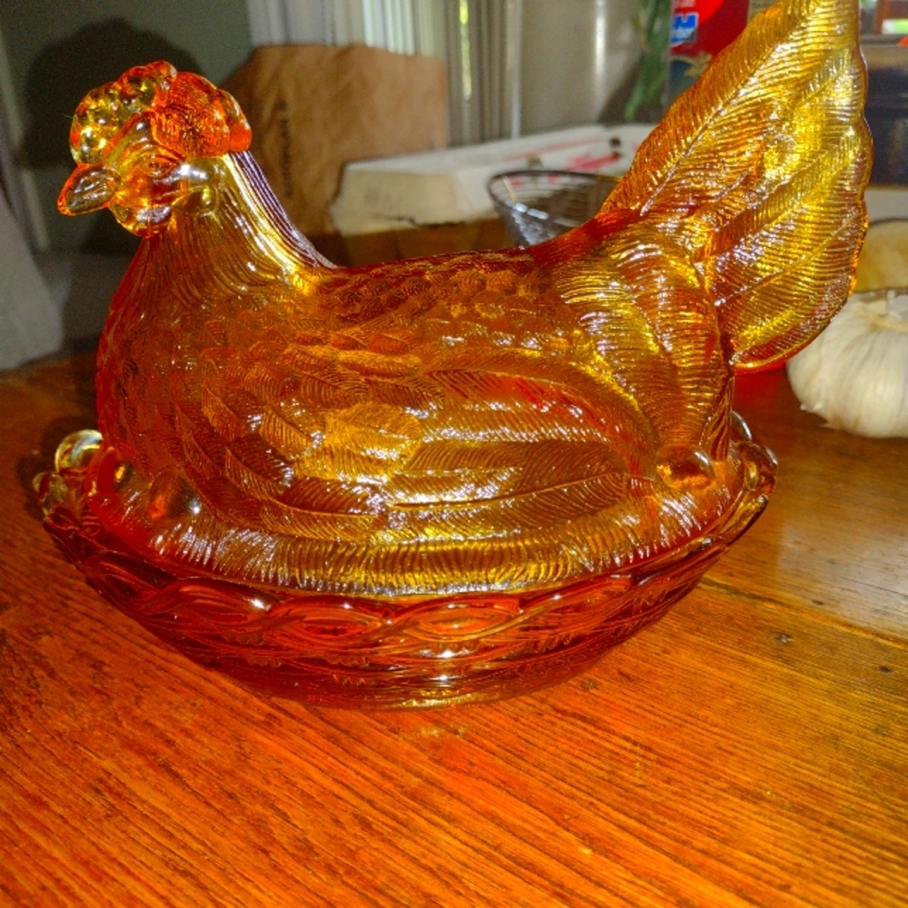 Vintage honey amber hen on nest